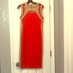 Sharp orange and tan dress.